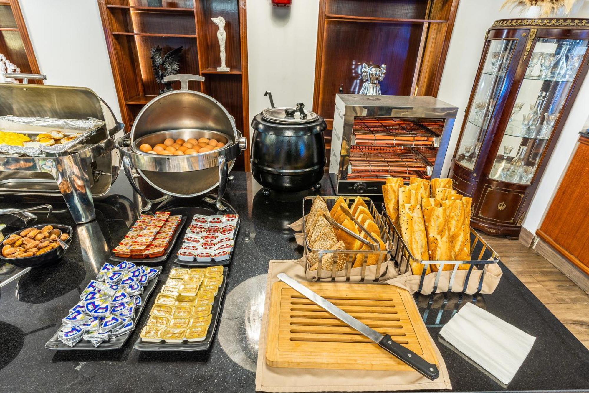 One Hotel Casablanca Luaran gambar A chafing dish (right)